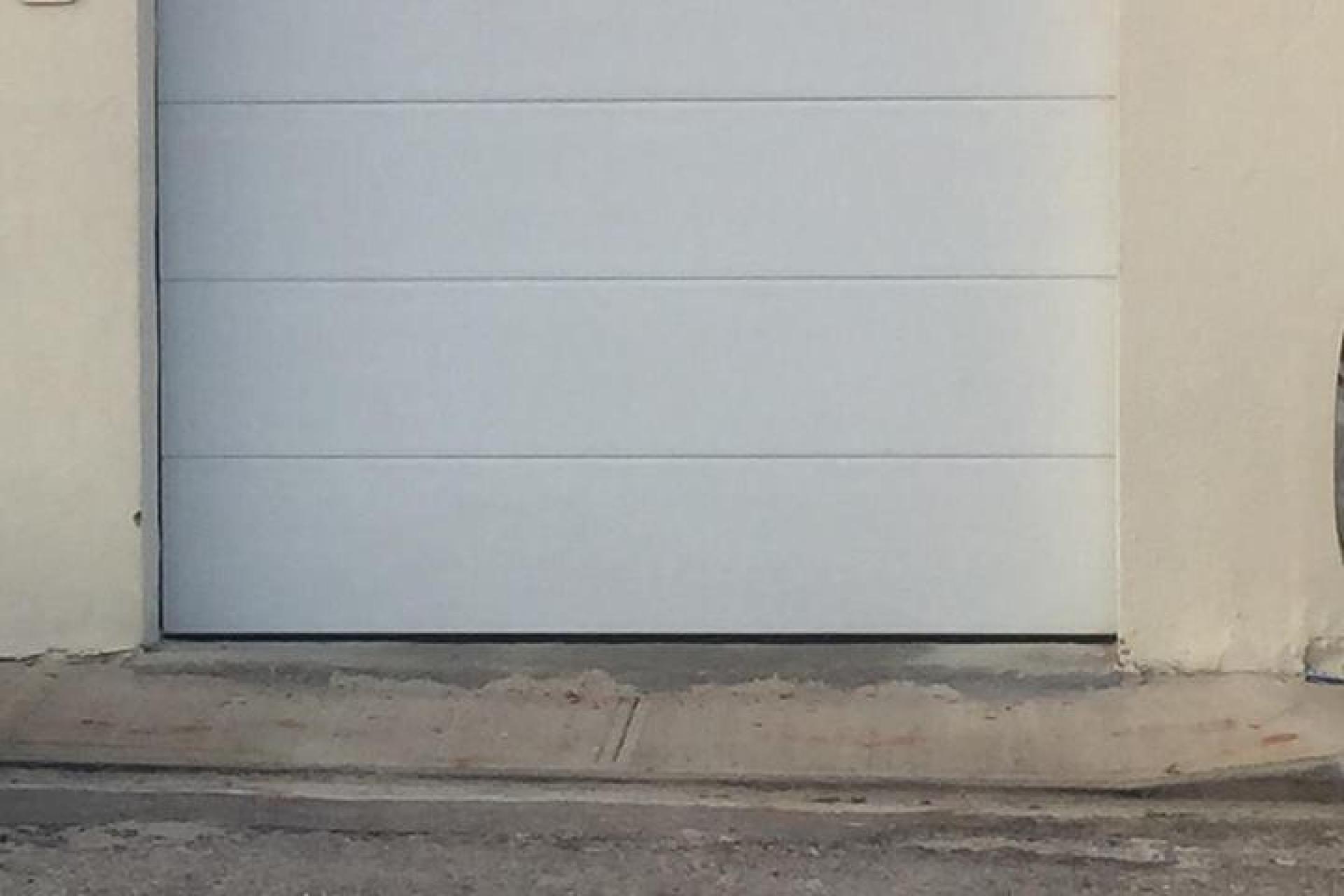 plain garage door, garage doors Malta